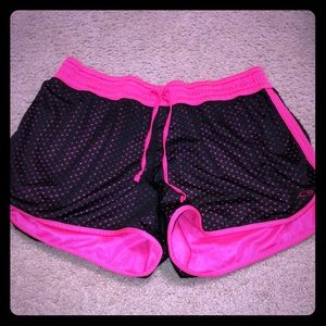 Black and pink athletic shorts